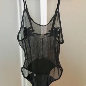 Black mesh bodysuit with palm tree detail